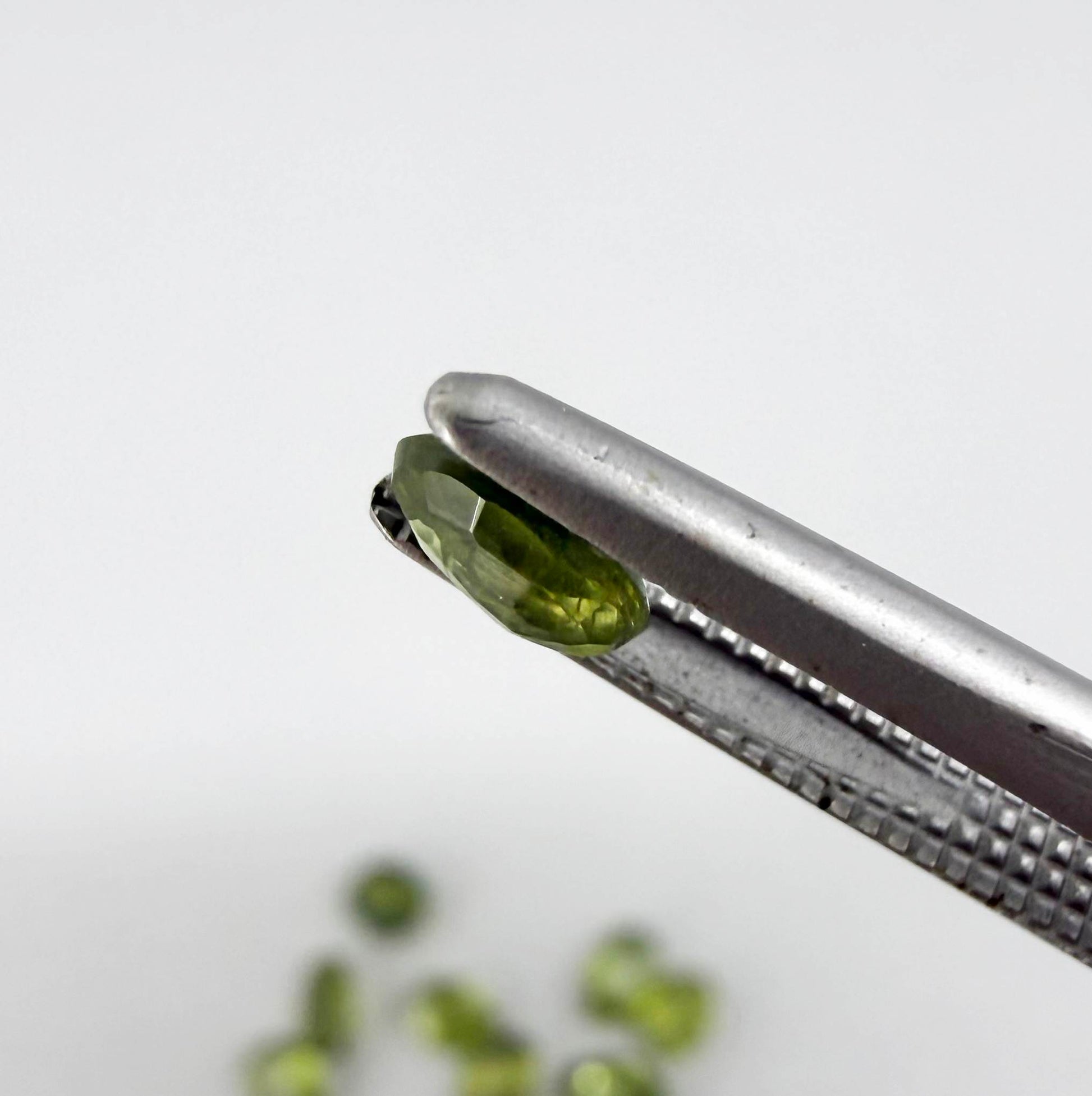 Lot of oval green sapphires from Thailand, 3.02ct total weight, unheated, with fresh to olive-green tones, mostly eye-clean to lightly included and transparent appearance.