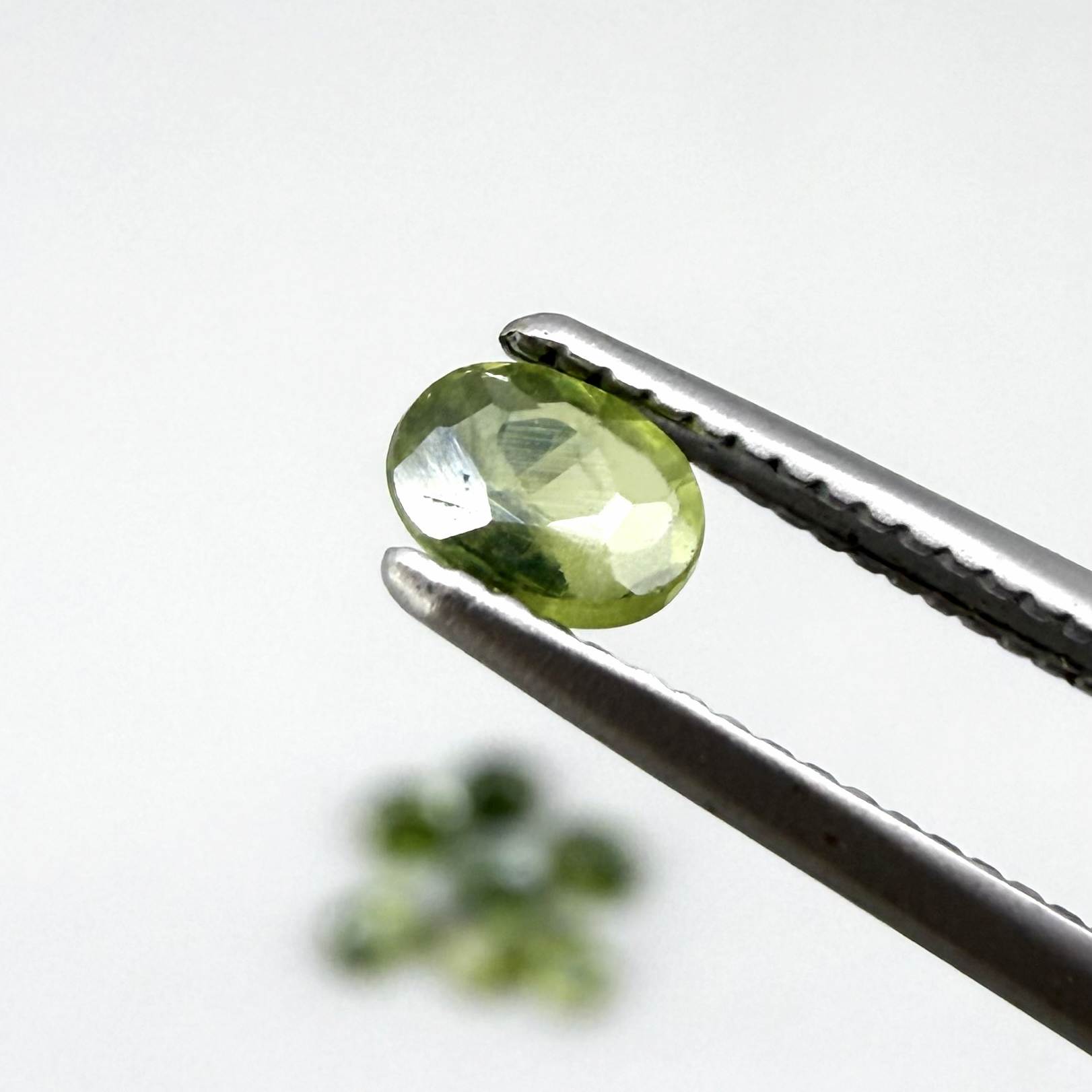 Lot of oval green sapphires from Thailand, 3.02ct total weight, unheated, with fresh to olive-green tones, mostly eye-clean to lightly included and transparent appearance.