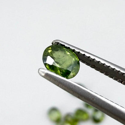 Lot of oval green sapphires from Thailand, 3.02ct total weight, unheated, with fresh to olive-green tones, mostly eye-clean to lightly included and transparent appearance.
