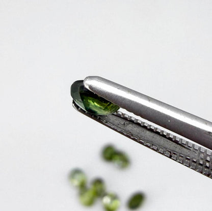 Lot of oval green sapphires from Thailand, 3.02ct total weight, unheated, with fresh to olive-green tones, mostly eye-clean to lightly included and transparent appearance.