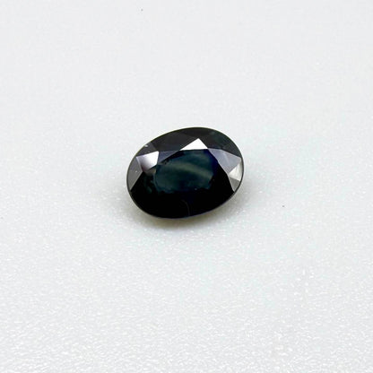 Untreated dark blue Thailand sapphire oval cut 1.02 ct with elegant inky blue color and vivid blue reflections
