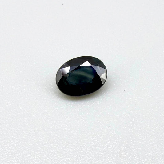 Untreated dark blue Thailand sapphire oval cut 1.02 ct with elegant inky blue color and vivid blue reflections