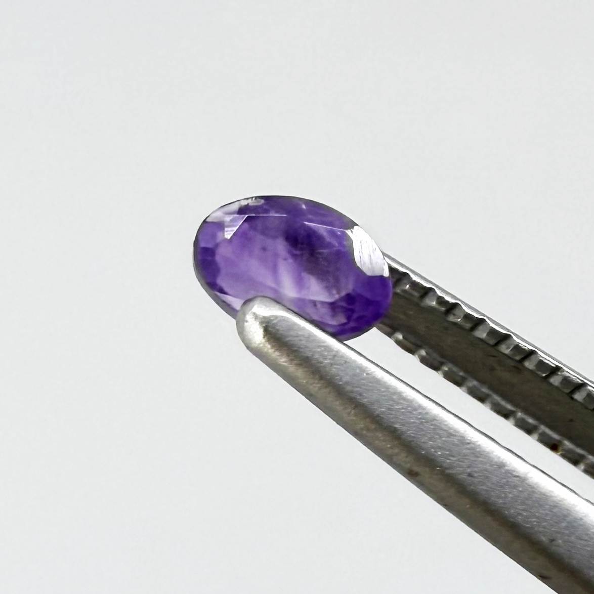 Natural Dark and Pale Purple Sapphire gemstone set oval & round