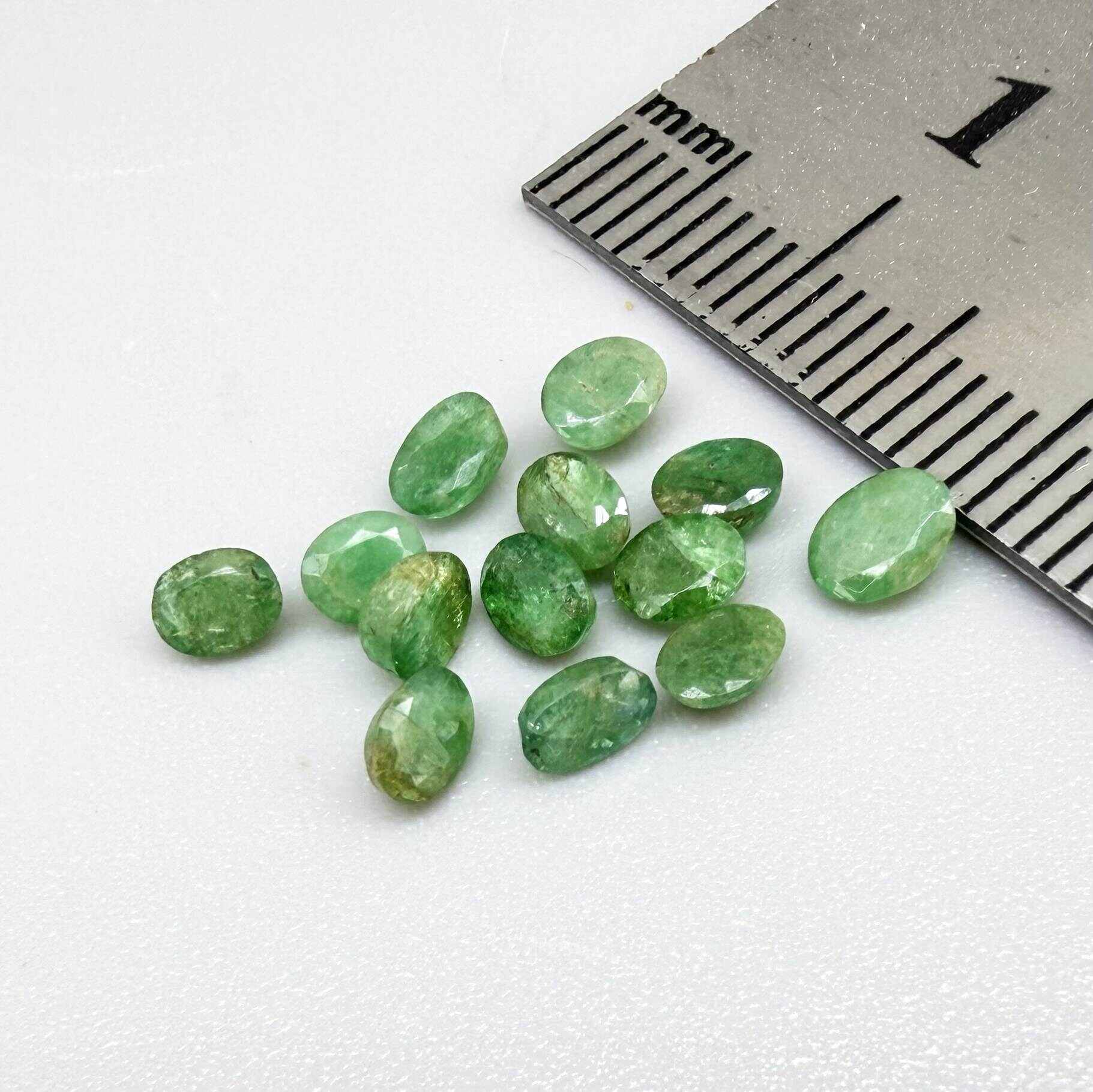 2.3 ct natural emerald lot from Zambia, oval stones 