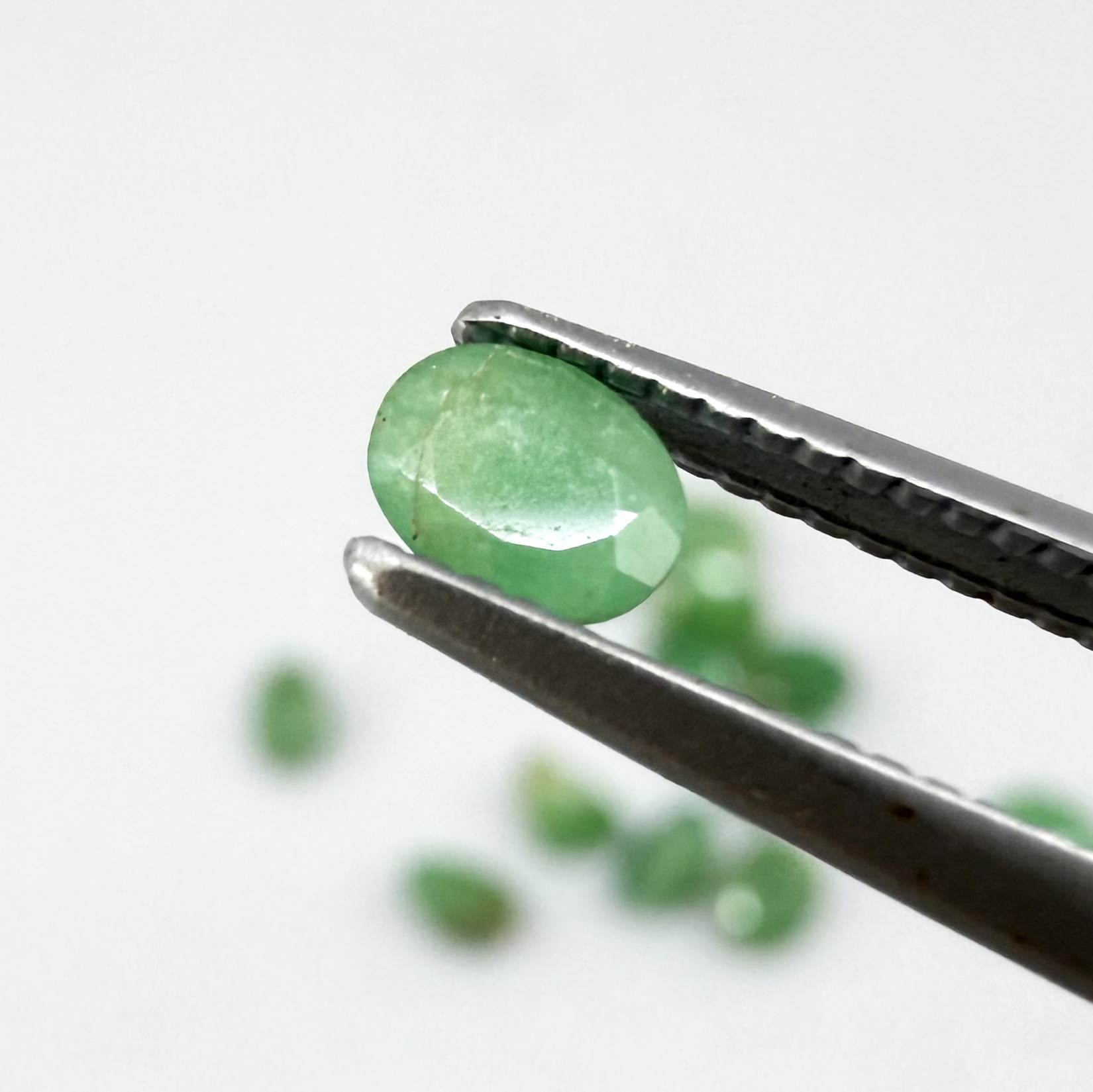 2.3 ct natural emerald lot from Zambia, oval stones 