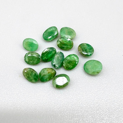 2.3 ct natural emerald lot from Zambia, oval stones 