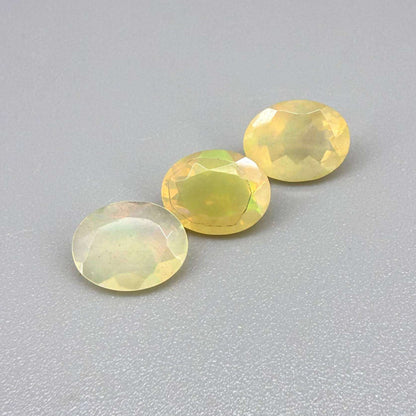 Natural Milky Yellow play-of-color Opal gemstone set, oval cut