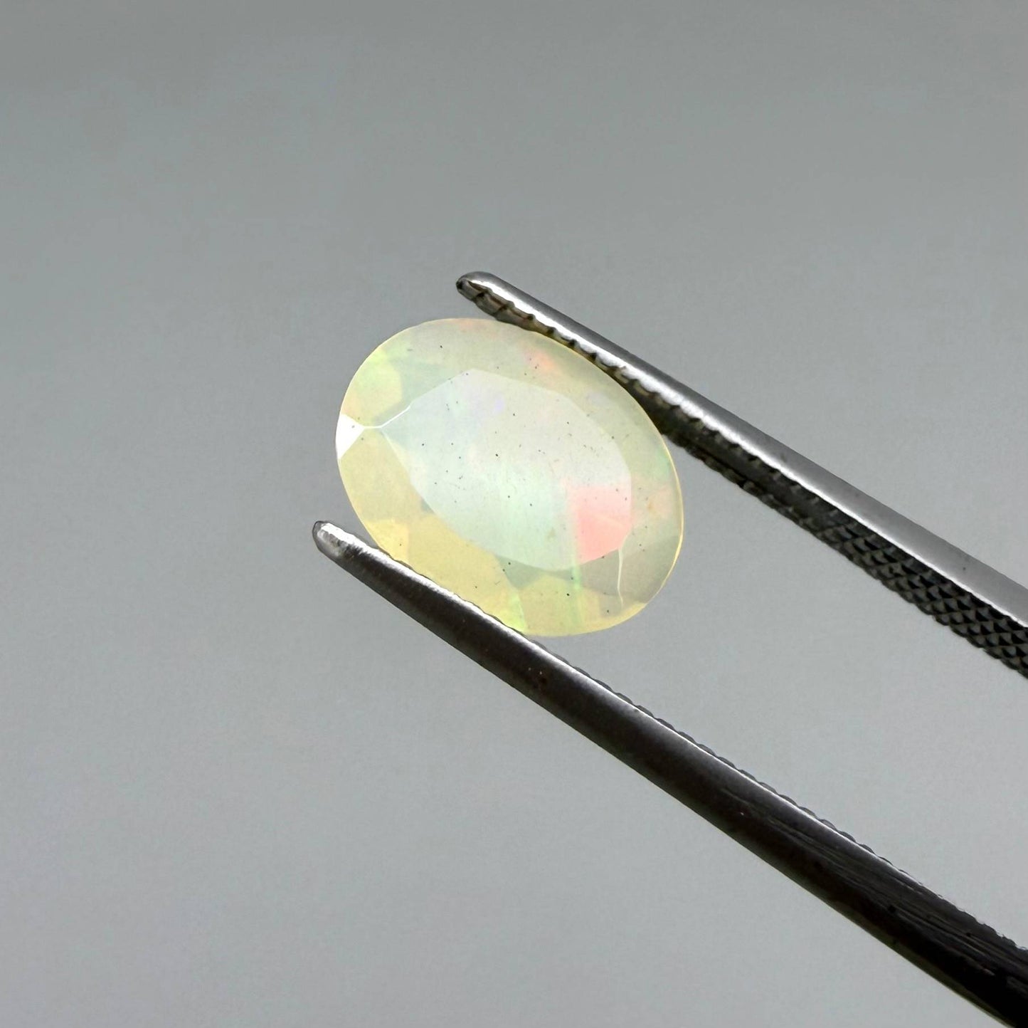 Natural Milky Yellow play-of-color Opal gemstone set, oval cut