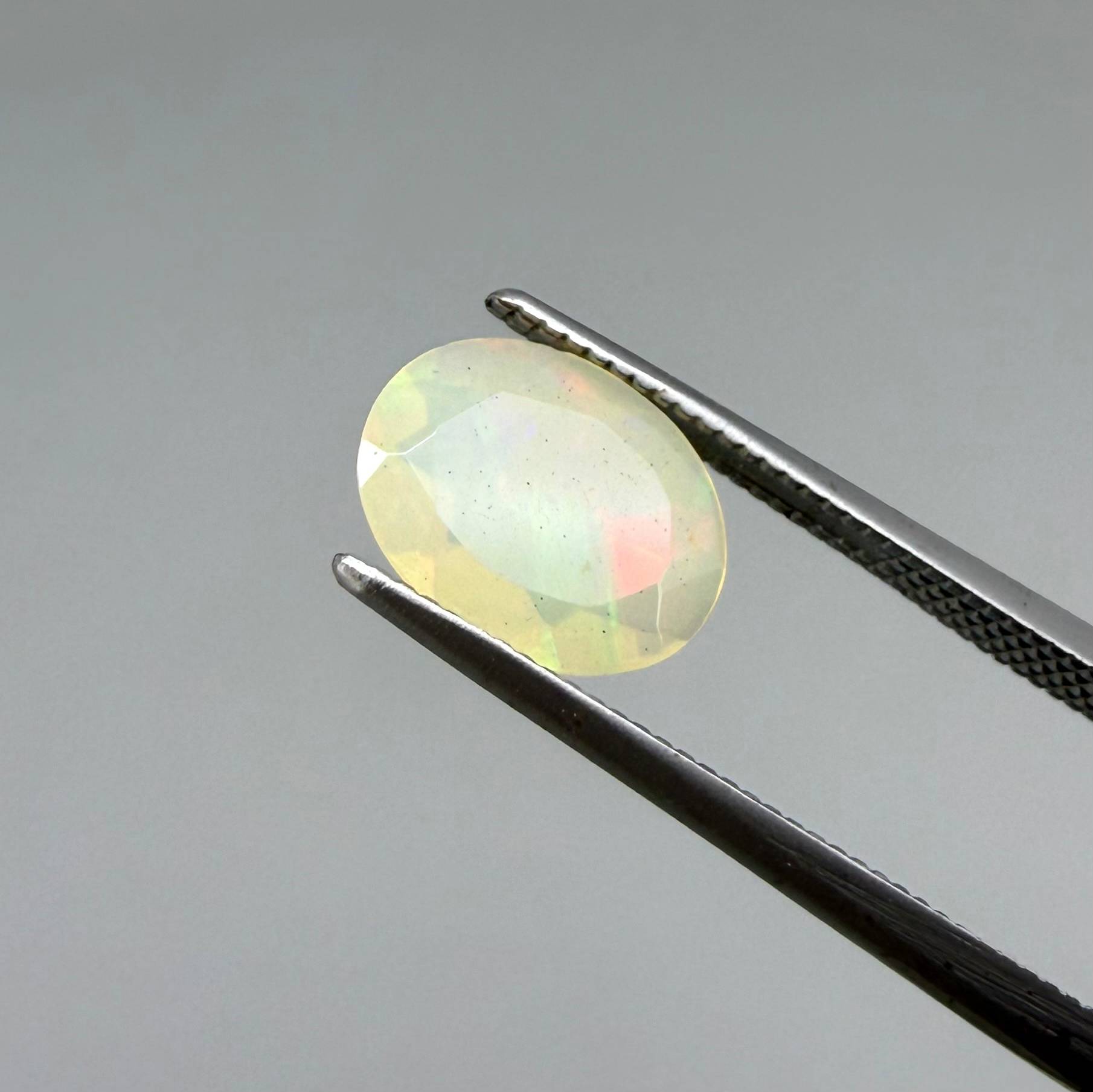 Natural Milky Yellow play-of-color Opal gemstone set, oval cut