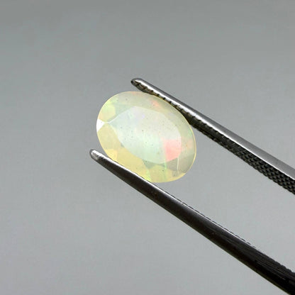 Natural Milky Yellow play-of-color Opal gemstone set, oval cut