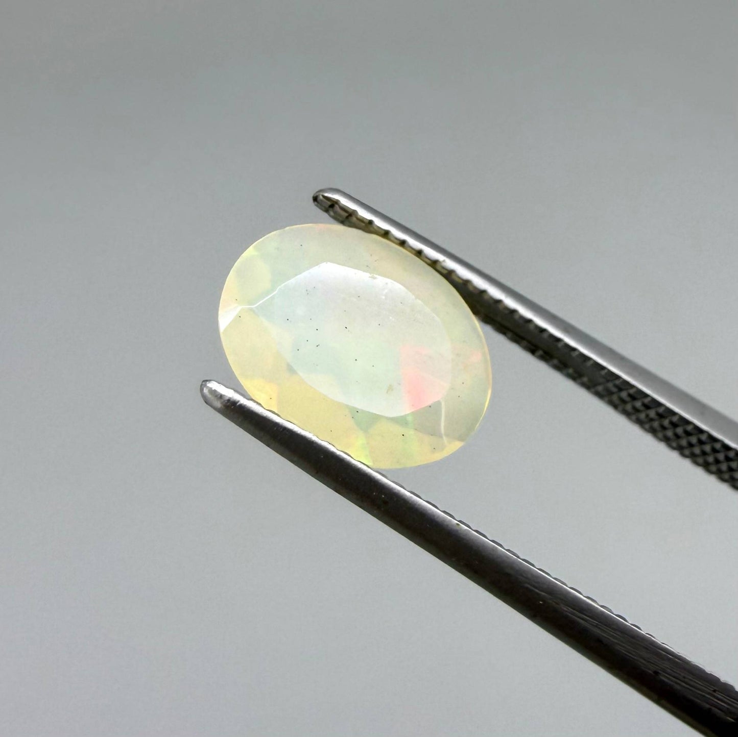 Natural Milky Yellow play-of-color Opal gemstone set, oval cut