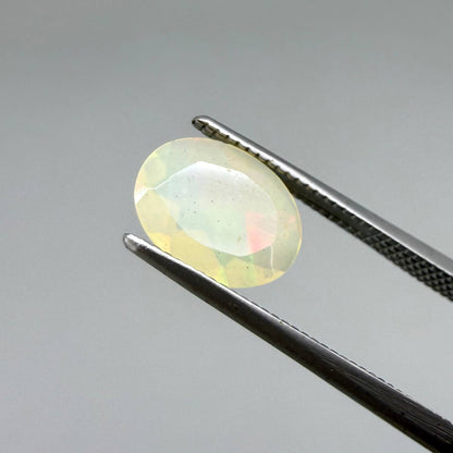 Natural Milky Yellow play-of-color Opal gemstone set, oval cut