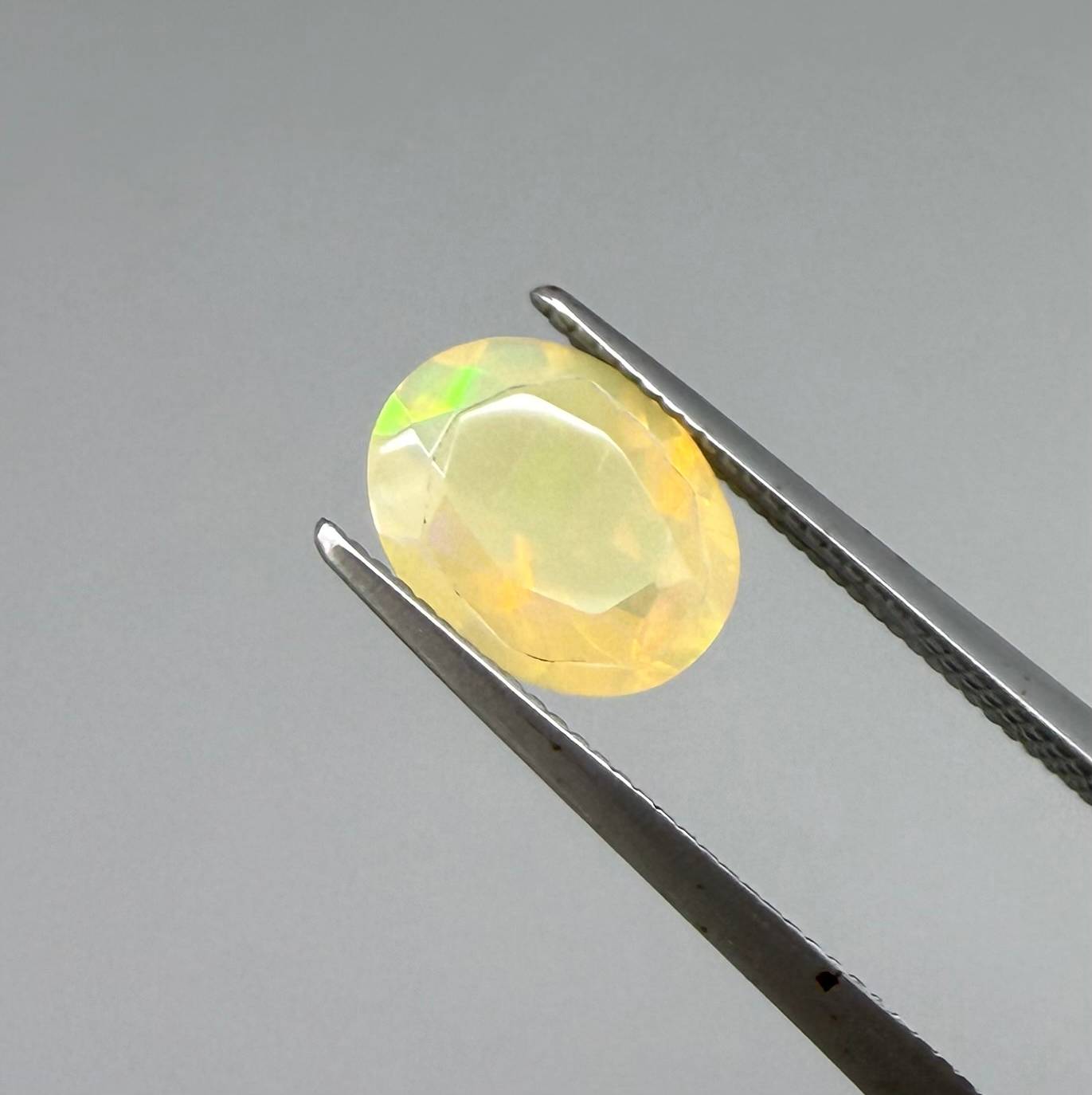 Natural Milky Yellow play-of-color Opal gemstone set, oval cut