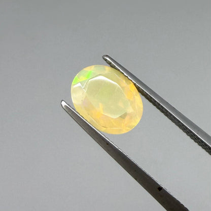 Natural Milky Yellow play-of-color Opal gemstone set, oval cut