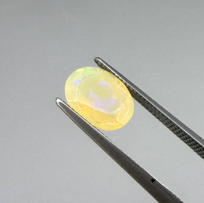 Natural Milky Yellow play-of-color Opal gemstone set, oval cut
