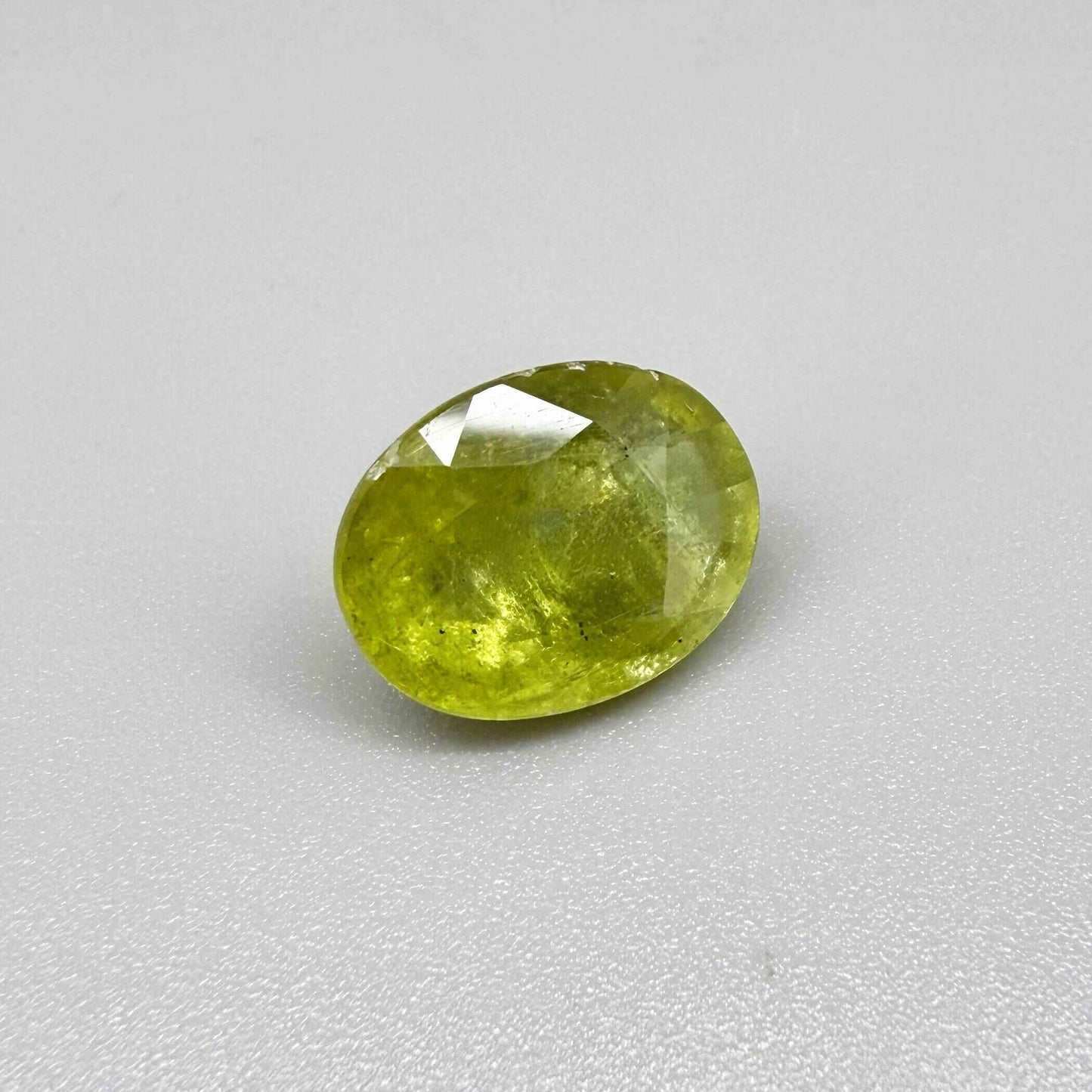Natural Green Yellow Sphene gemstone, oval cut