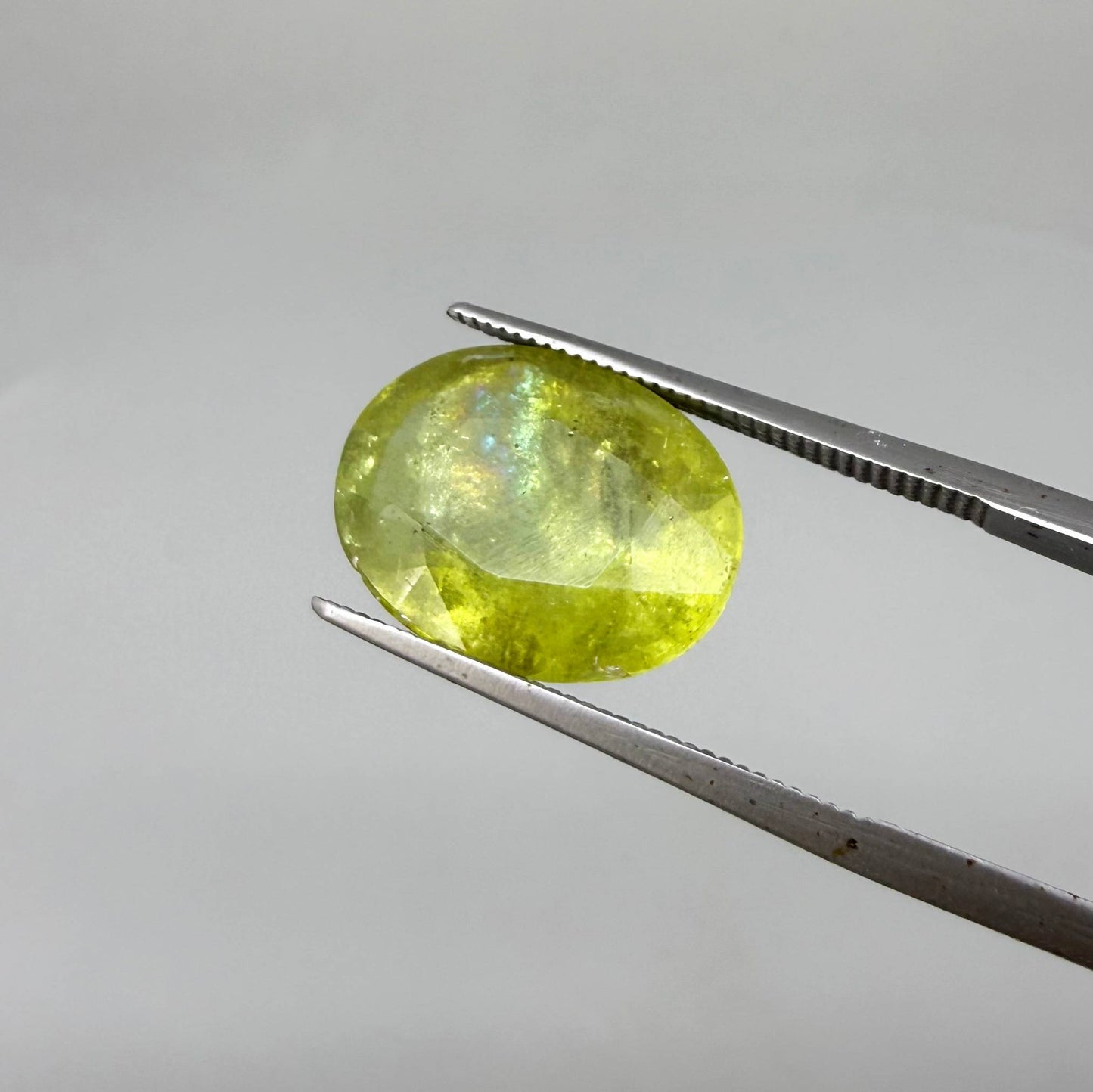 Natural Green Yellow Sphene gemstone, oval cut