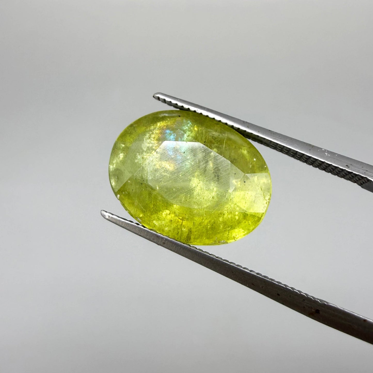 Natural Green Yellow Sphene gemstone, oval cut