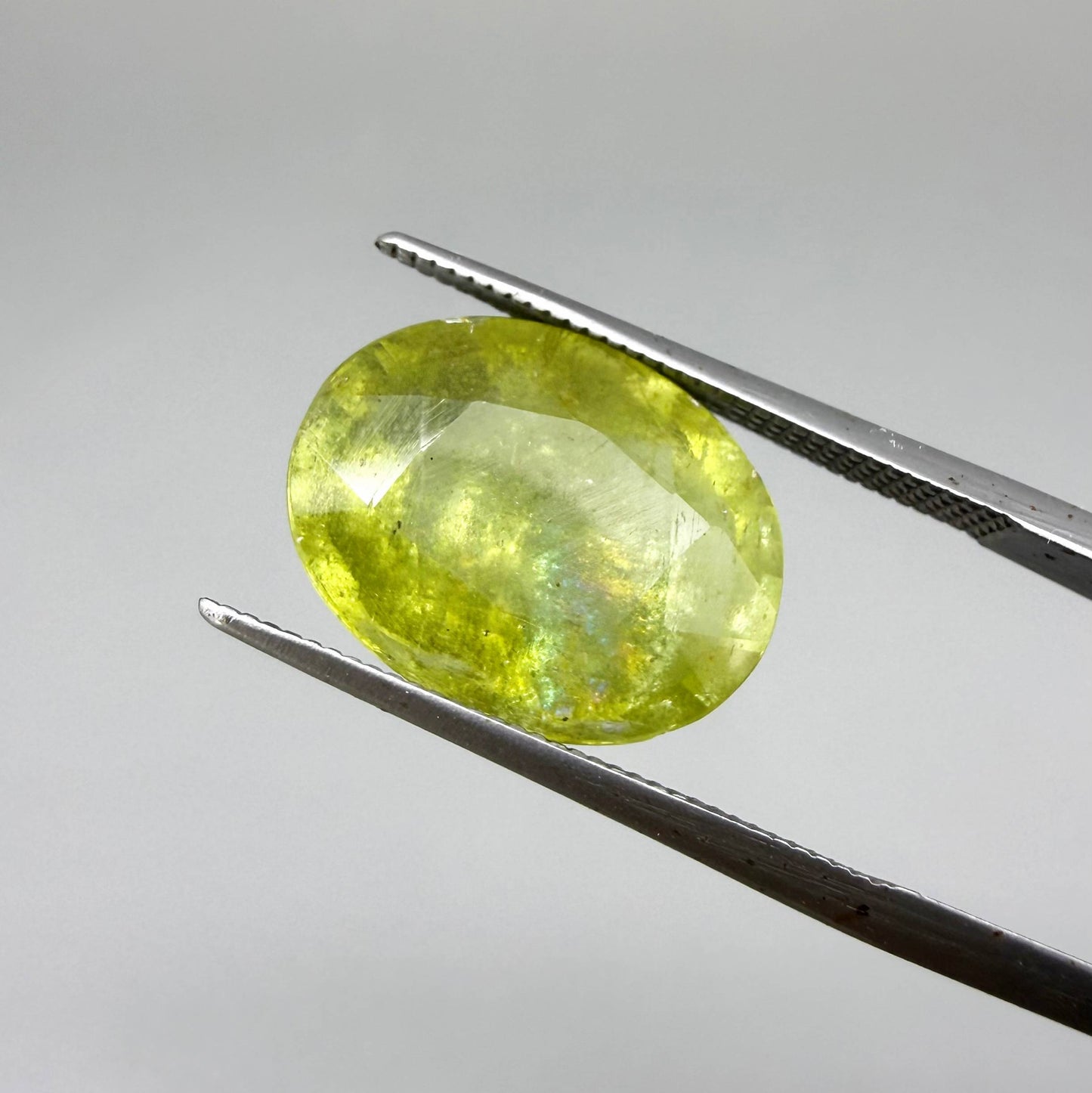 Natural Green Yellow Sphene gemstone, oval cut