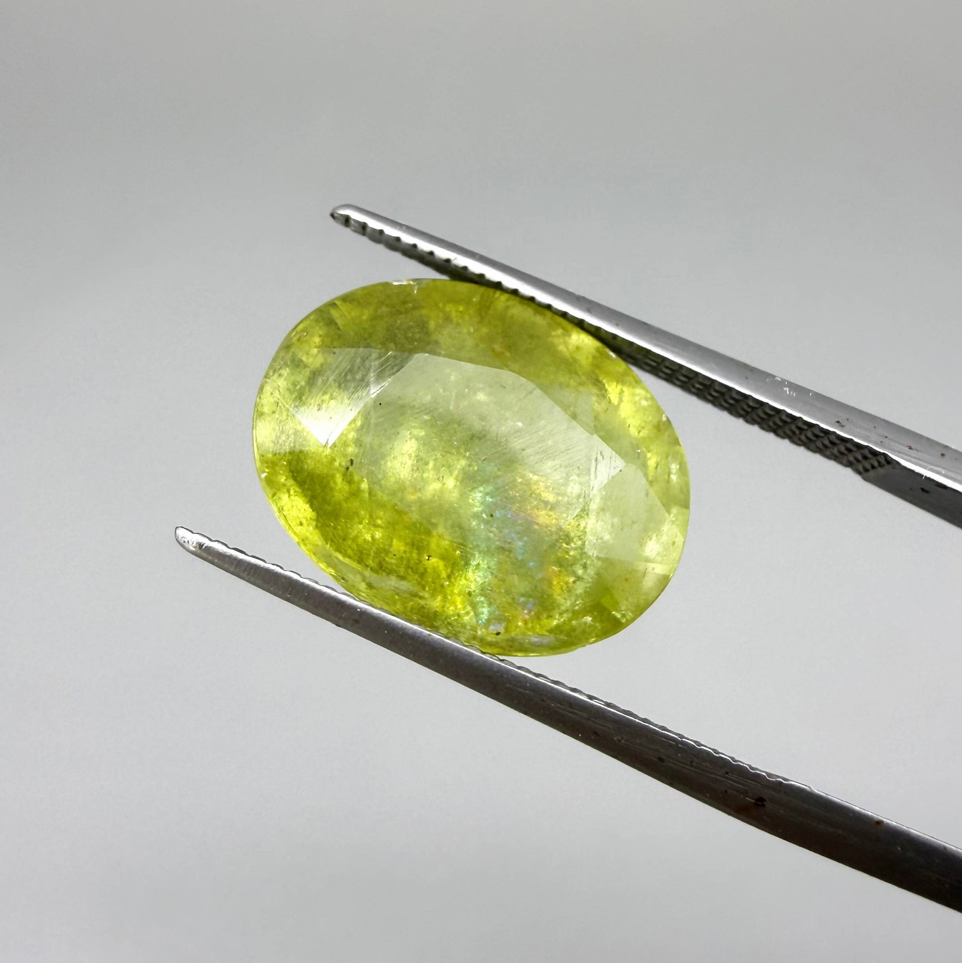 Natural Green Yellow Sphene gemstone, oval cut