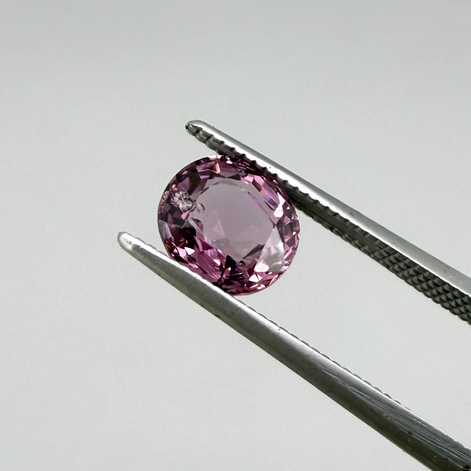 Natural Pink Purple Spinel gemstone, oval shape