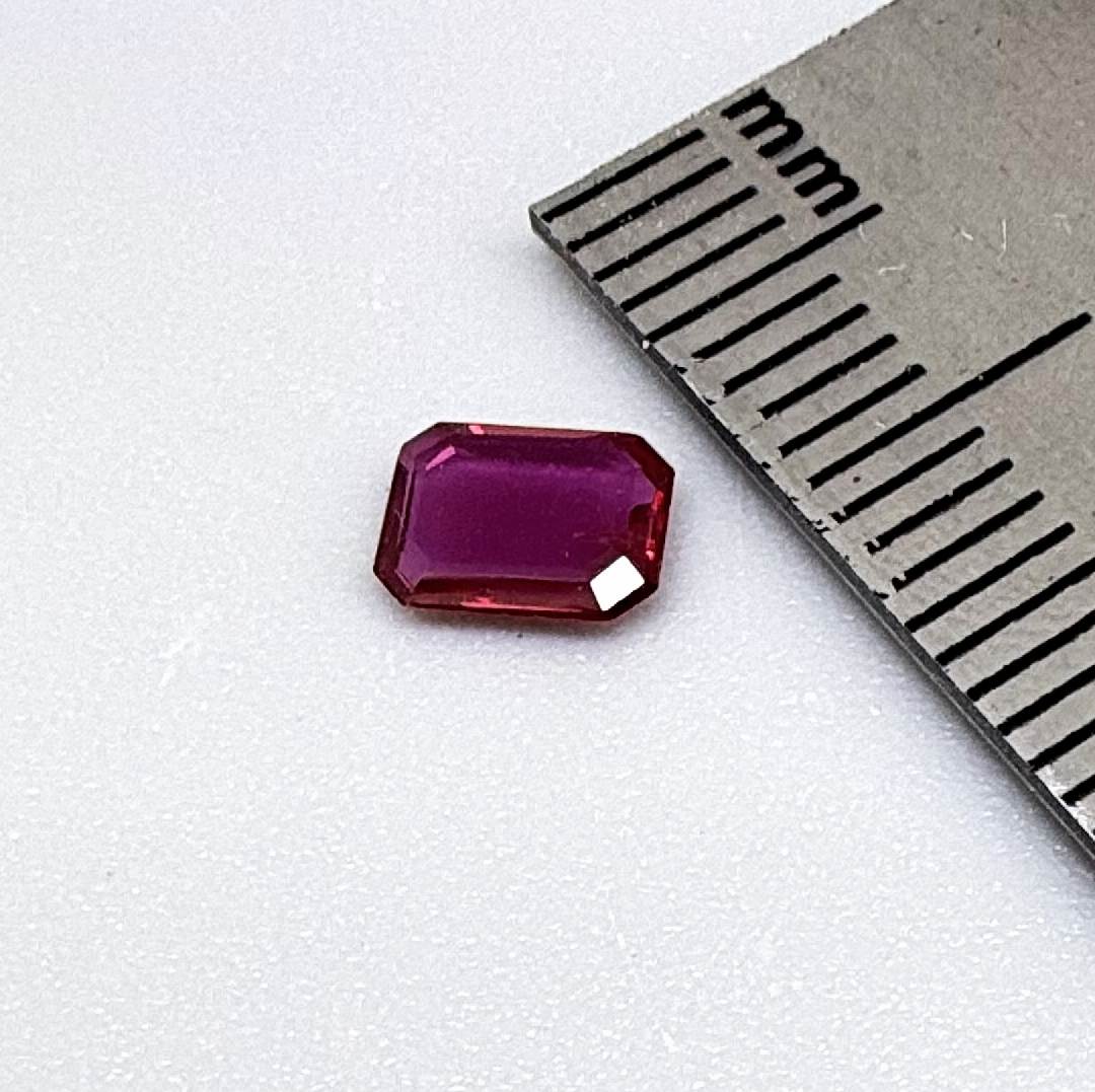 Heated ruby from Bo Rai Thailand, octagon cut, 0.55 ct with rich purplish-red color and elegant faceting.