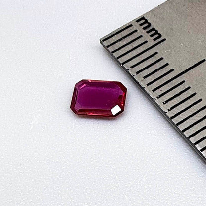 Heated ruby from Bo Rai Thailand, octagon cut, 0.55 ct with rich purplish-red color and elegant faceting.