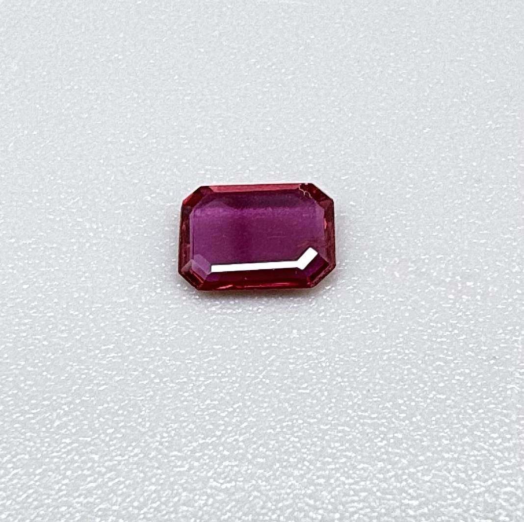 Heated ruby from Bo Rai Thailand, octagon cut, 0.55 ct with rich purplish-red color and elegant faceting.