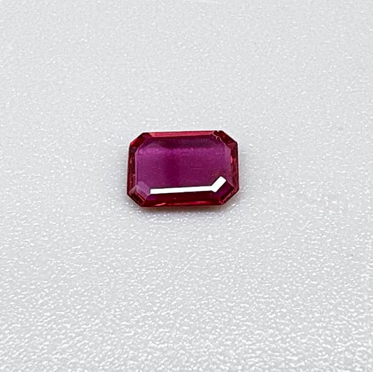 Heated ruby from Bo Rai Thailand, octagon cut, 0.55 ct with rich purplish-red color and elegant faceting.