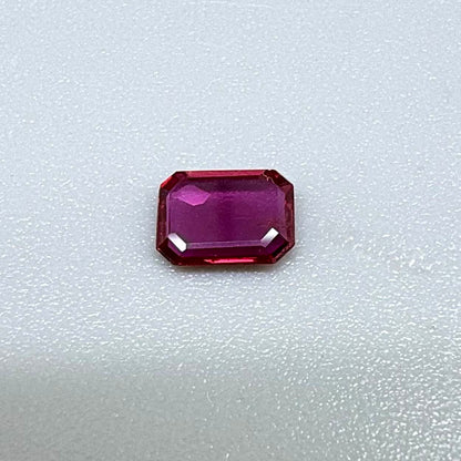 Heated ruby from Bo Rai Thailand, octagon cut, 0.55 ct with rich purplish-red color and elegant faceting.
