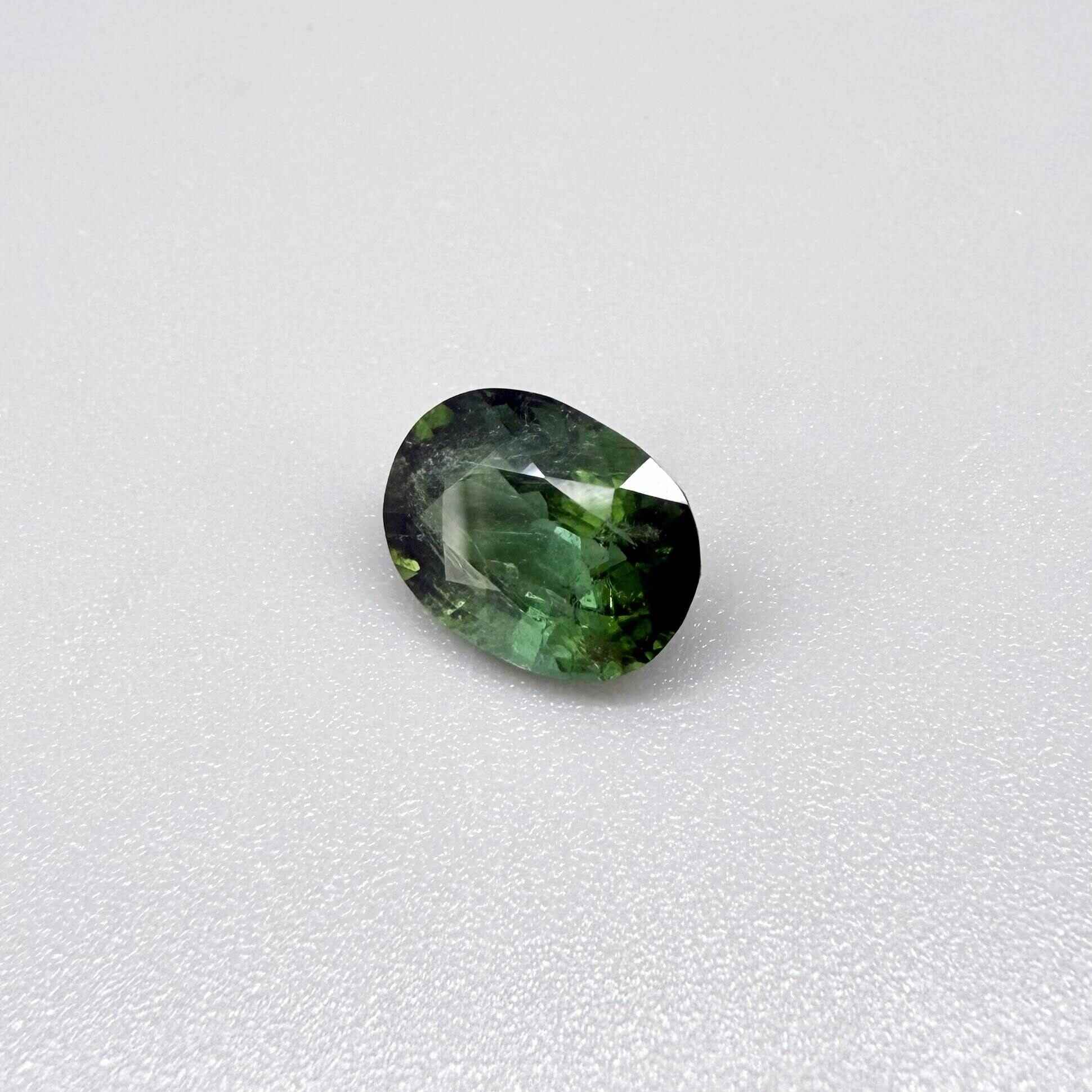 Natural green tourmaline from Africa, oval cut, 3.17 ct with vibrant green color and natural brilliance.