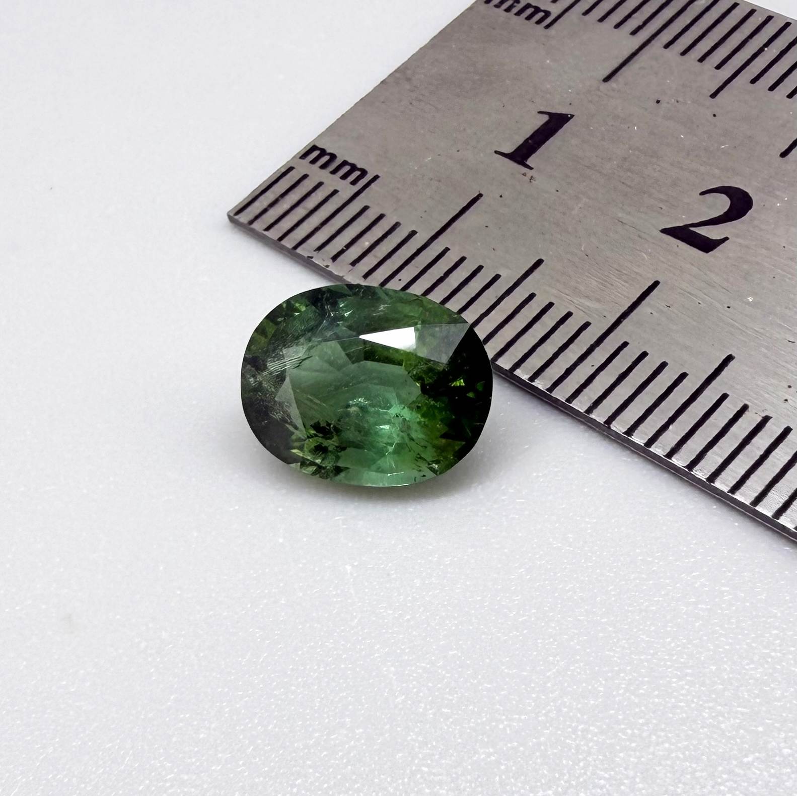 Natural green tourmaline from Africa, oval cut, 3.17 ct with vibrant green color and natural brilliance.