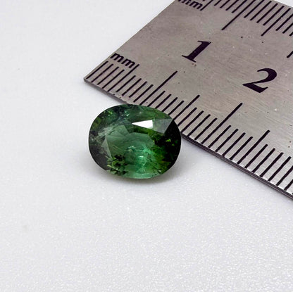 Natural green tourmaline from Africa, oval cut, 3.17 ct with vibrant green color and natural brilliance.