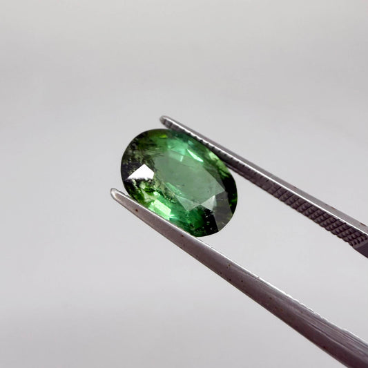 Natural green tourmaline from Africa, oval cut, 3.17 ct with vibrant green color and natural brilliance.