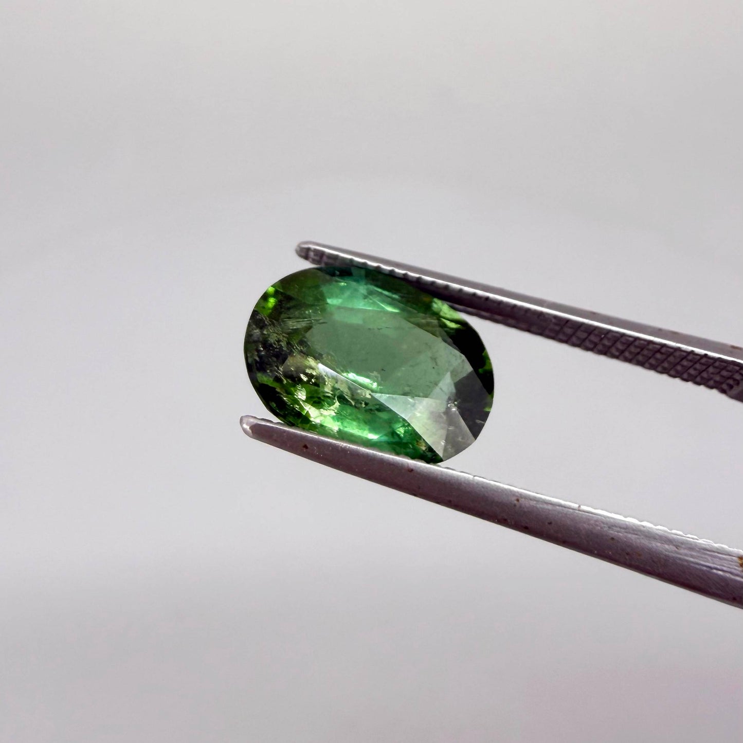 Natural green tourmaline from Africa, oval cut, 3.17 ct with vibrant green color and natural brilliance.