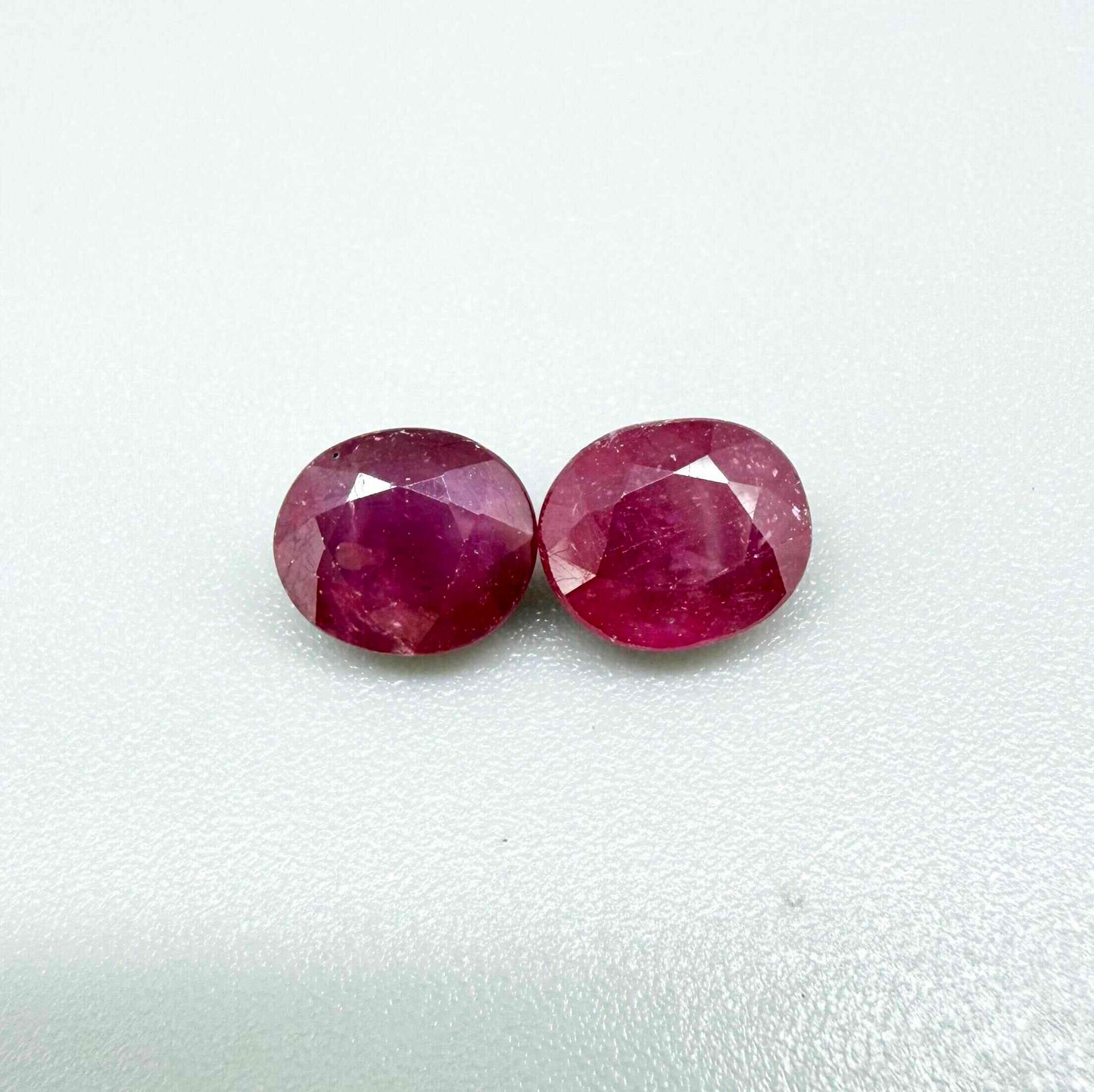 Natural Ruby Pair 4.18 ct from Mozambique – matching oval faceted pinkish-red gemstones