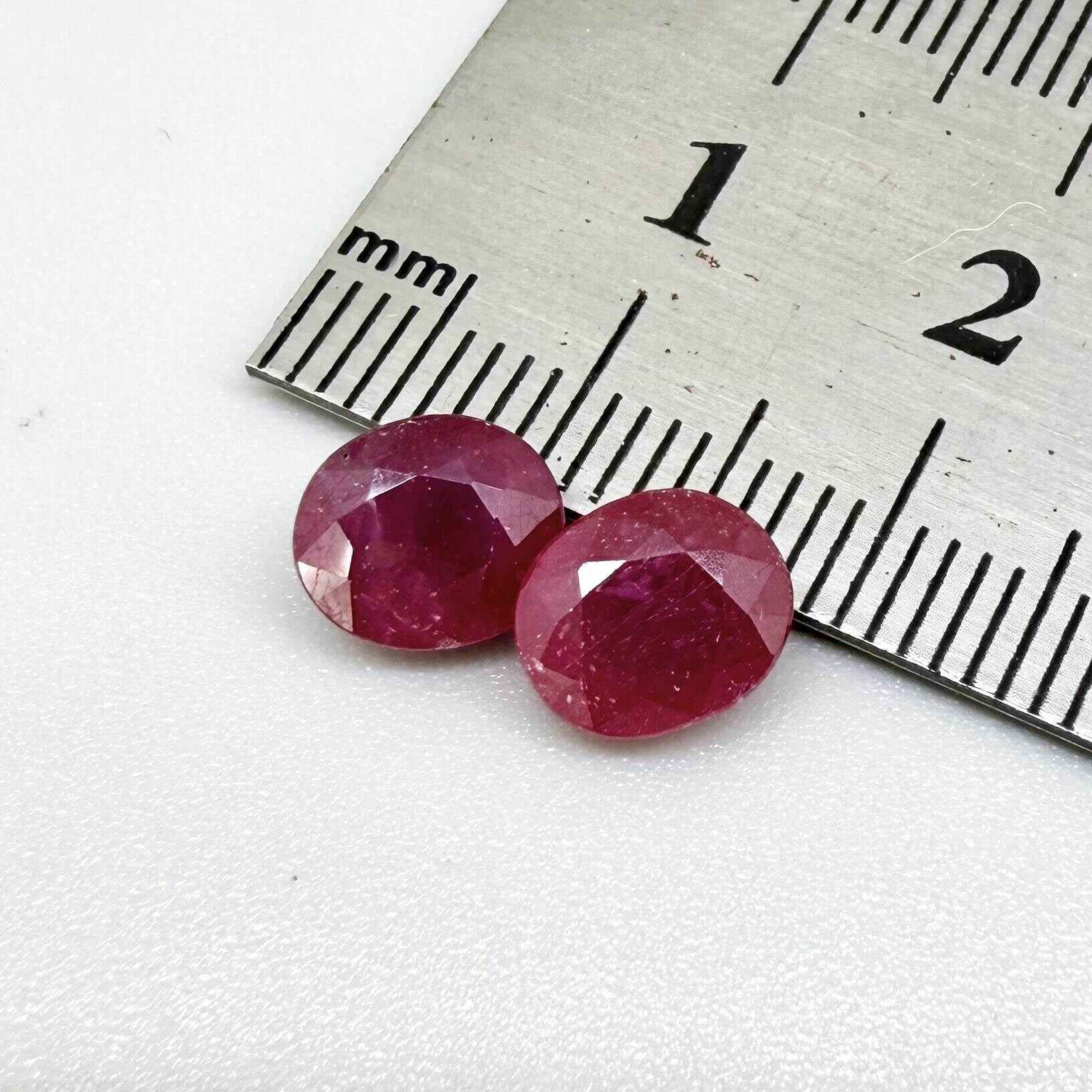Natural Ruby Pair 4.18 ct from Mozambique – matching oval faceted pinkish-red gemstones