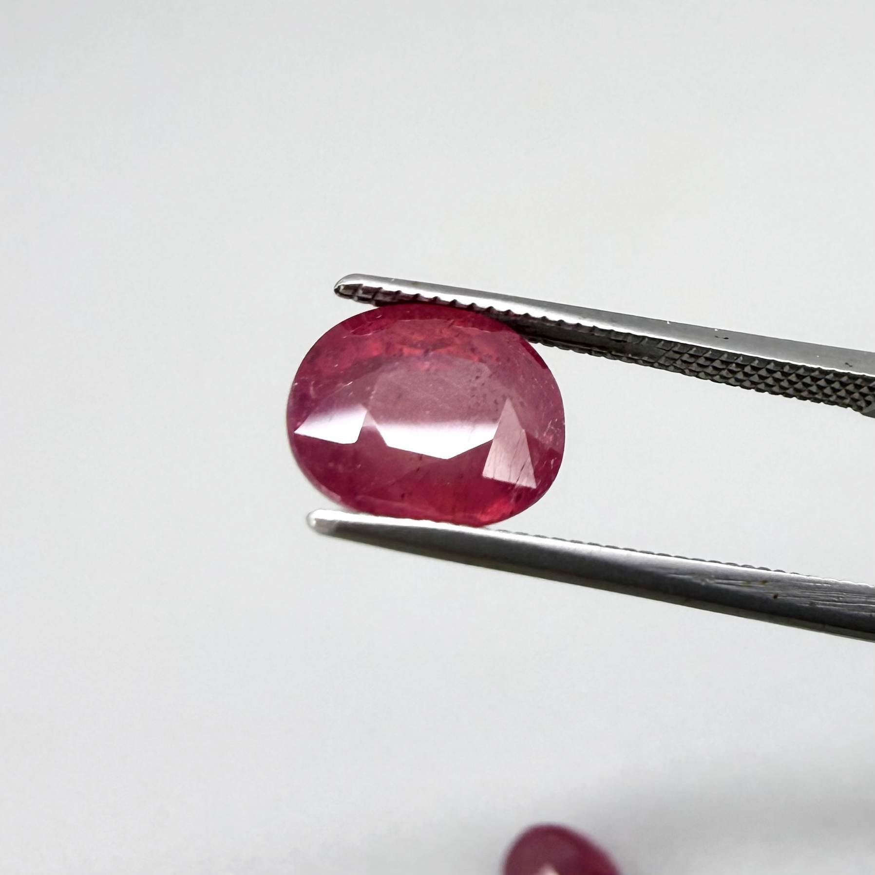 Natural Ruby Pair 6.92 ct from Mozambique – matching oval faceted pinkish-red gemstones