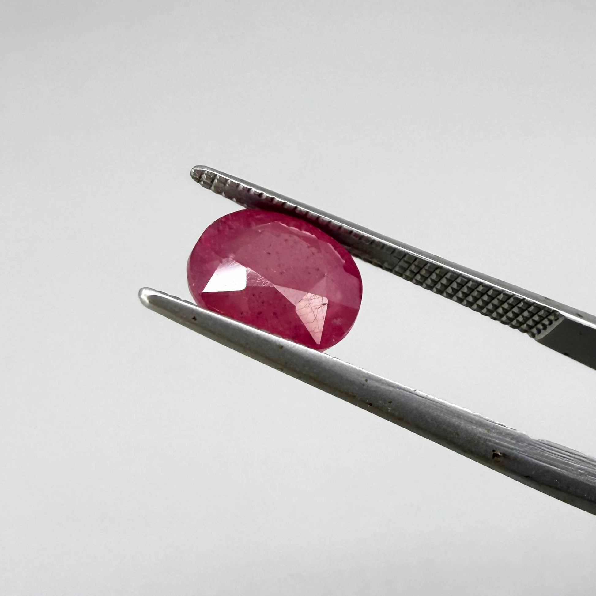 Natural Ruby Pair 6.92 ct from Mozambique – matching oval faceted pinkish-red gemstones