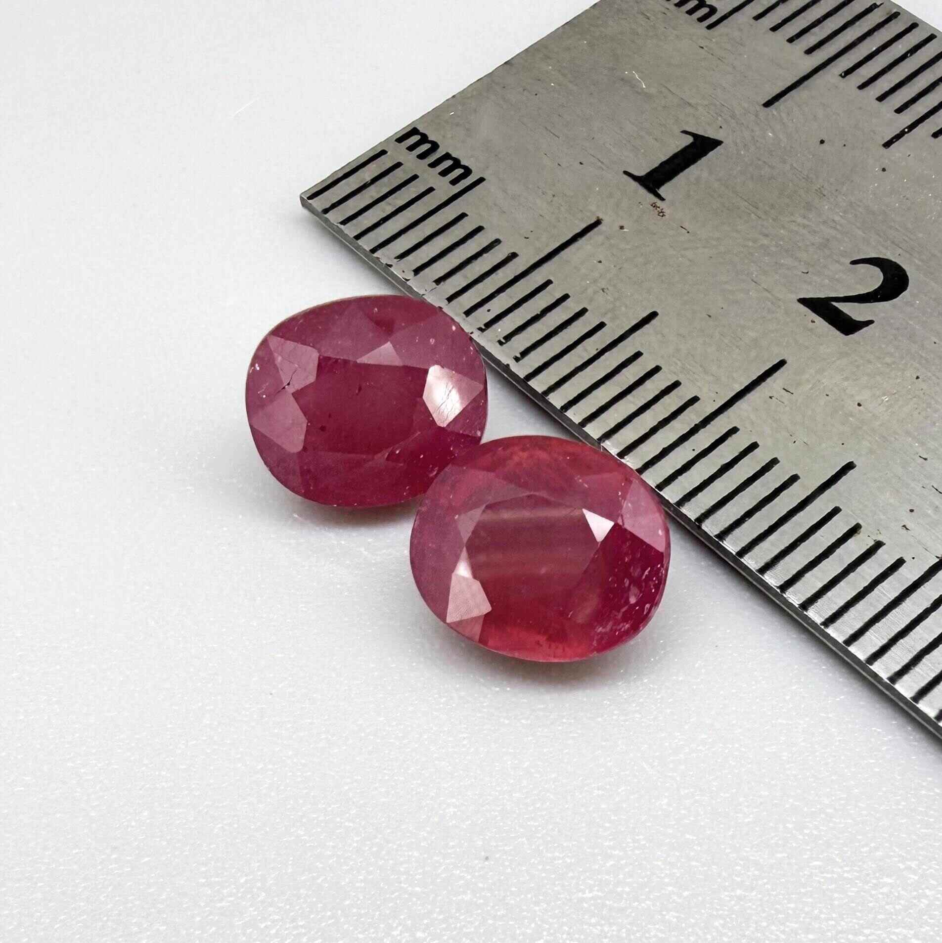 Natural Ruby Pair 6.92 ct from Mozambique – matching oval faceted pinkish-red gemstones