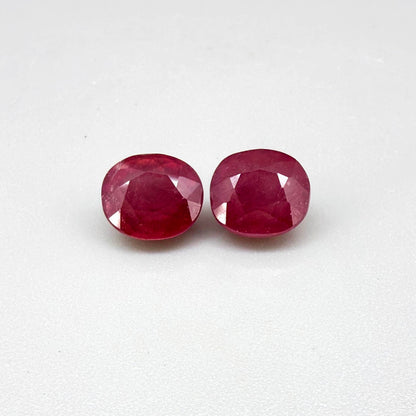 Natural Ruby Pair 6.92 ct from Mozambique – matching oval faceted pinkish-red gemstones