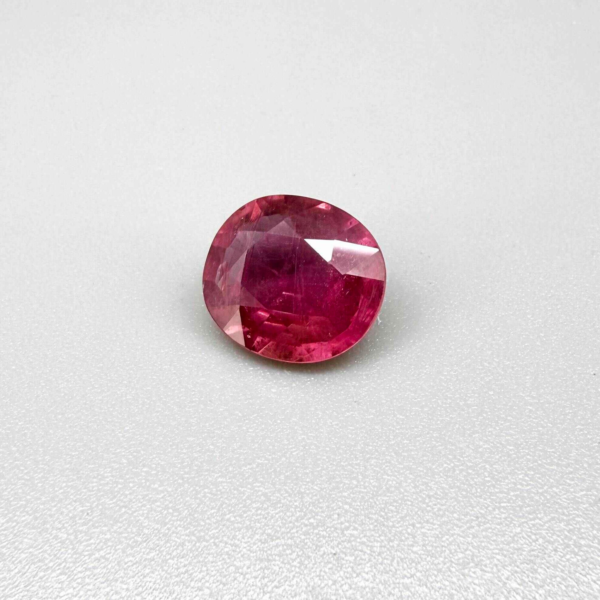 Natural Ruby 4.91 ct from Mozambique – treated oval faceted gemstone with vivid pinkish-red color