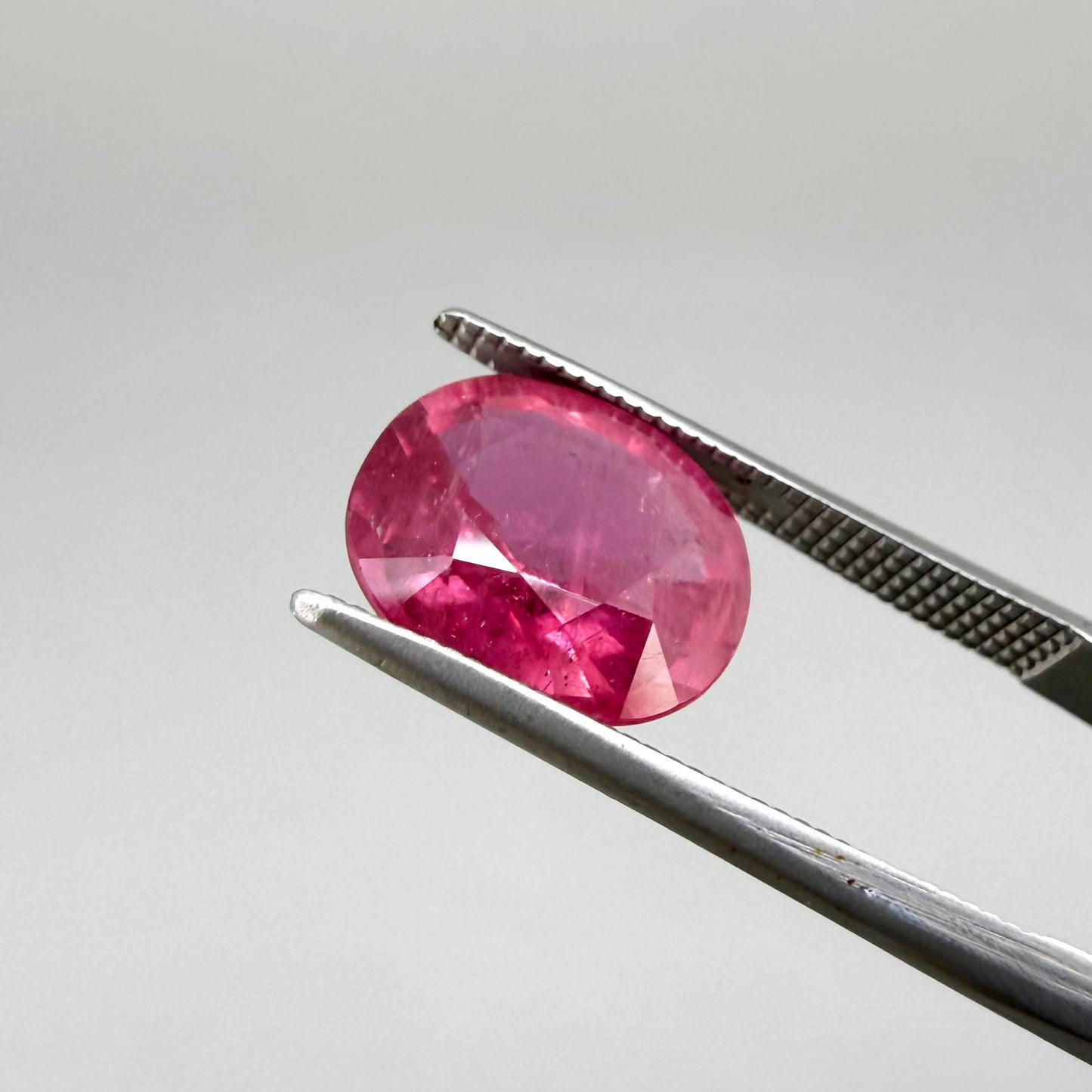 Natural Ruby 4.91 ct from Mozambique – treated oval faceted gemstone with vivid pinkish-red color