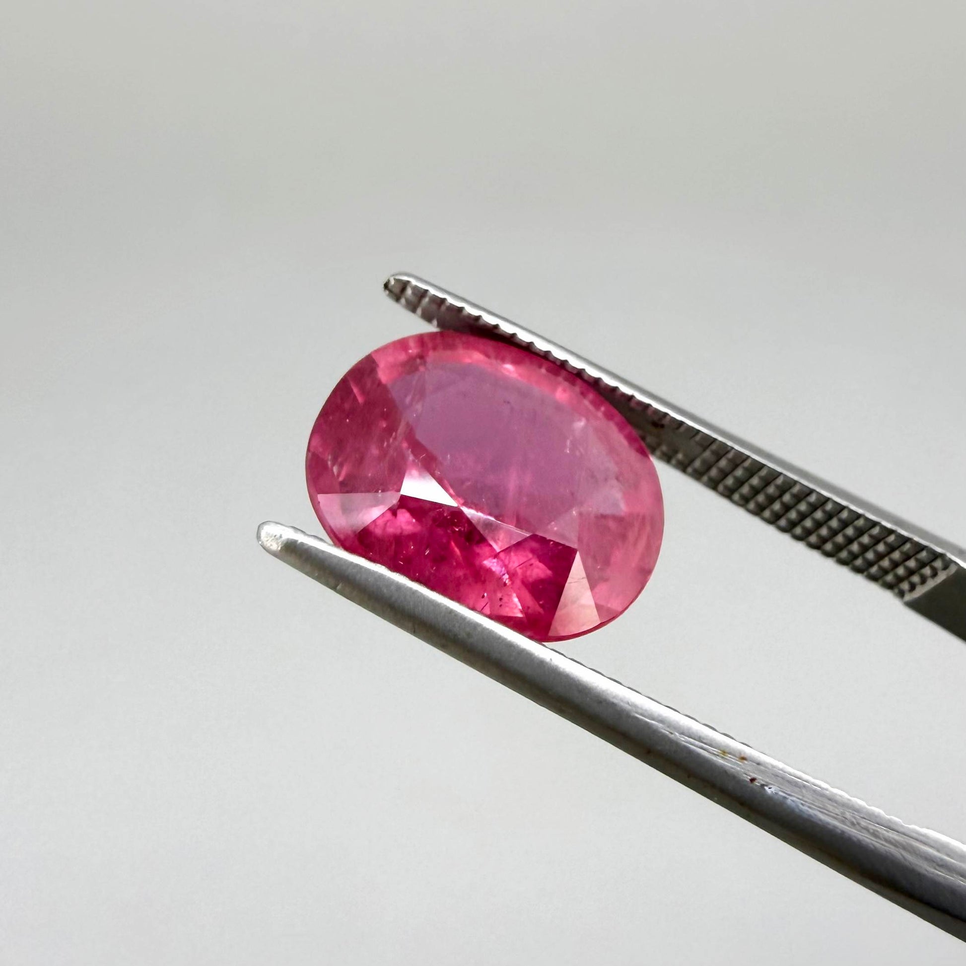 Natural Ruby 4.91 ct from Mozambique – treated oval faceted gemstone with vivid pinkish-red color
