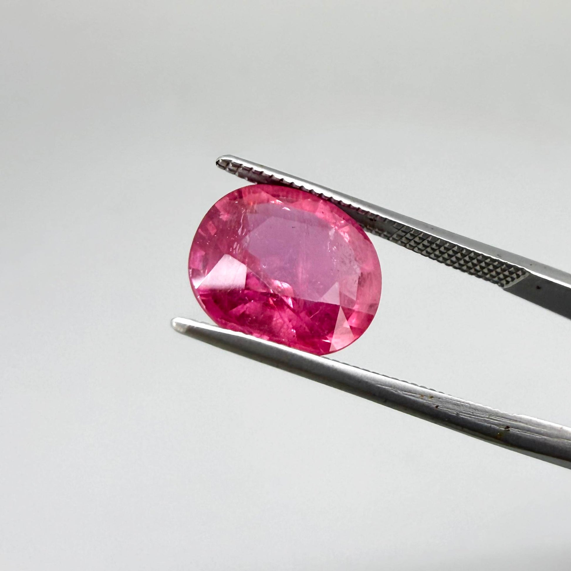 Natural Ruby 4.91 ct from Mozambique – treated oval faceted gemstone with vivid pinkish-red color