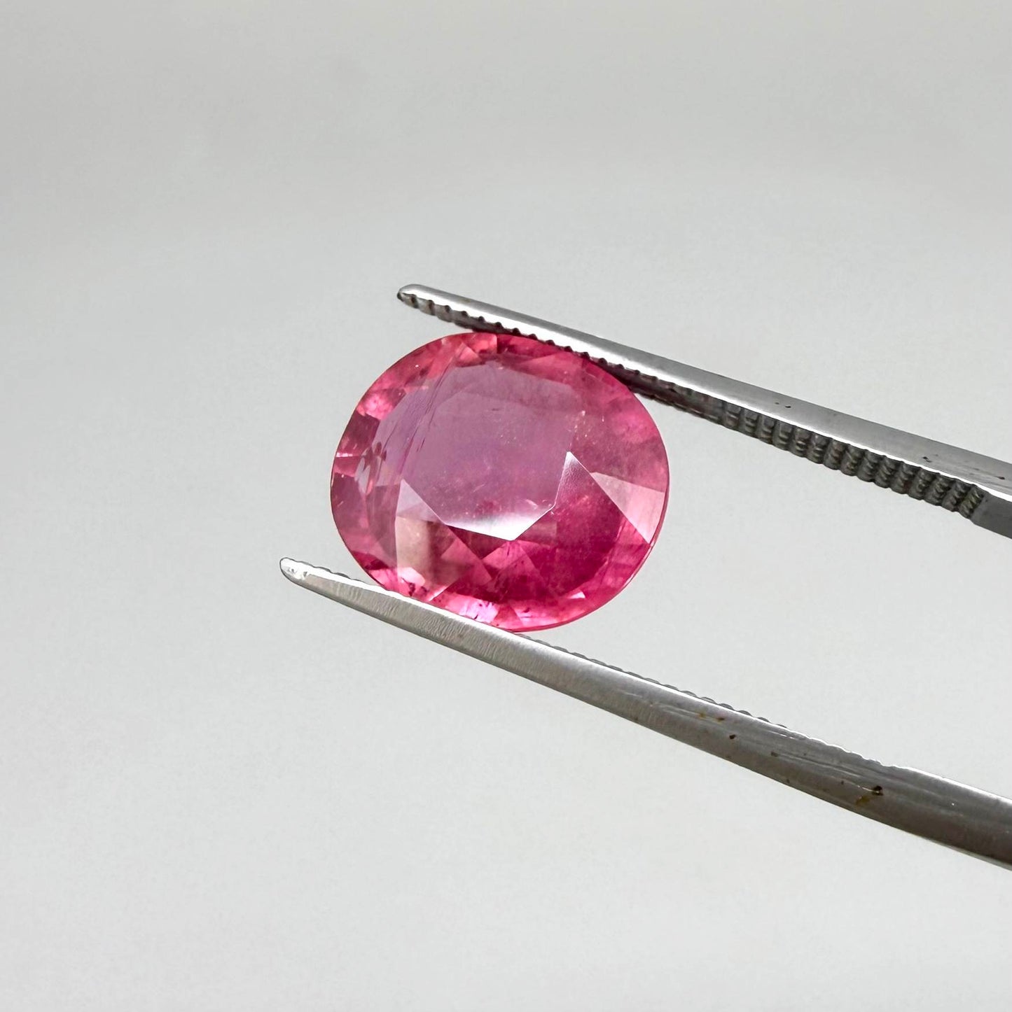 Natural Ruby 4.91 ct from Mozambique – treated oval faceted gemstone with vivid pinkish-red color