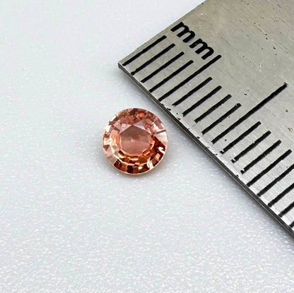 Natural Padparadscha Sapphire 0.37 ct from Songea Tanzania – heated round faceted gemstone with pink and peach hues