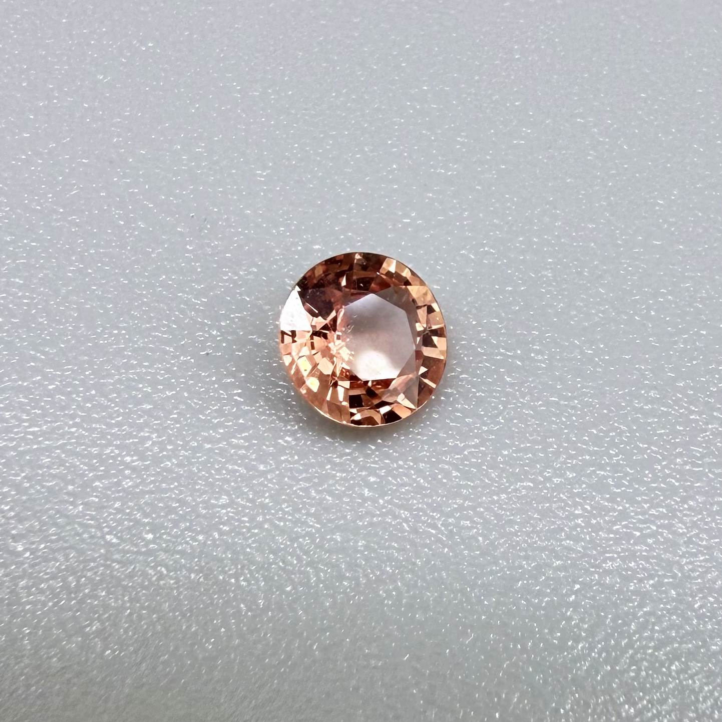 Natural Padparadscha Sapphire 0.37 ct from Songea Tanzania – heated round faceted gemstone with pink and peach hues