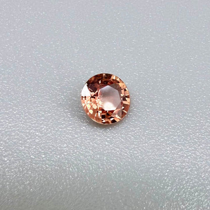 Natural Padparadscha Sapphire 0.37 ct from Songea Tanzania – heated round faceted gemstone with pink and peach hues