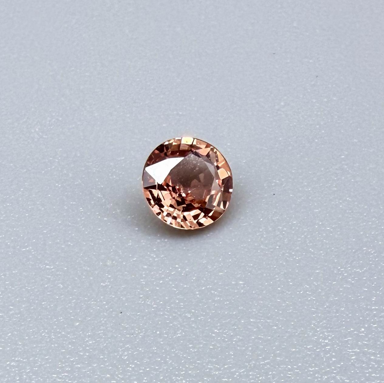 Natural Padparadscha Sapphire 0.37 ct from Songea Tanzania – heated round faceted gemstone with pink and peach hues